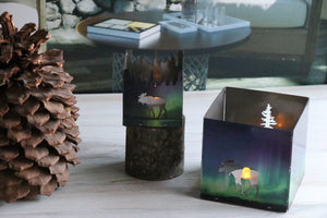 Small moose and forest stainless steel candle holder.  