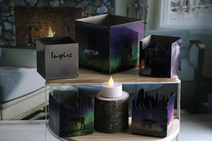 stainless steel candle holder with the word Inspire cut out.  Beautiful!