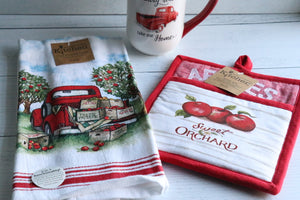 Sweet Orchard Pocket Mitt, Red and white with Apples on the front.